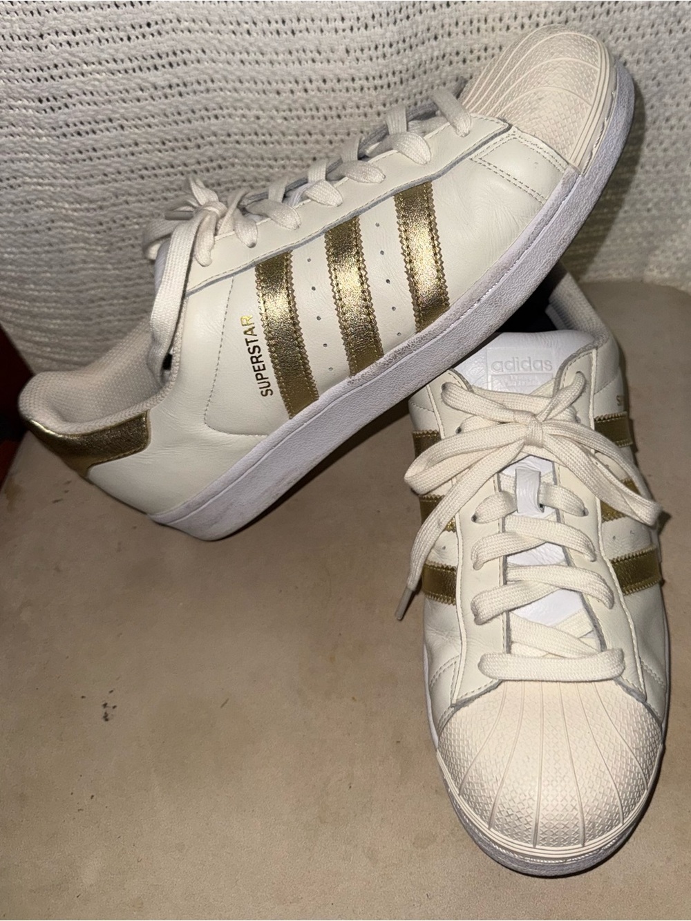 adidas White and Gold Superstar Sneakers
